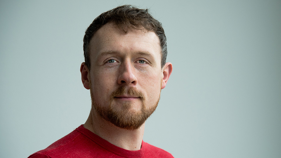 Man wearing a red shirt.